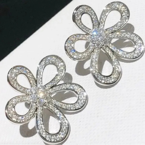 Jewelry - Floral silvertone rhinestone earrings - new in package.